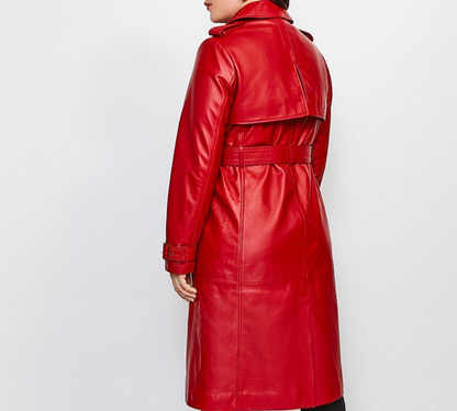 Red leather trench coat worn by a person on a white background