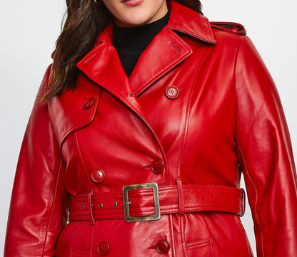 Red leather trench coat worn by a person on a white background
