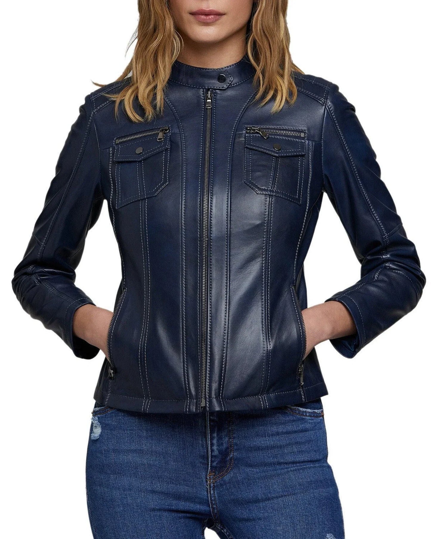 Woman wearing ZERXHIDE navy blue leather jacket open — front view showing 2 chest zip pockets and band collar, styled with white knit top