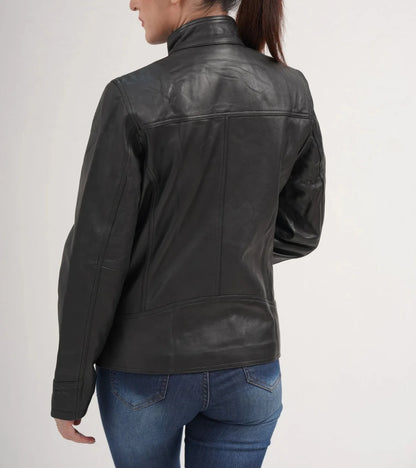 ZERXHIDE black leather jacket back view — fitted lambskin silhouette with panel seaming and band collar, styled with jeans
