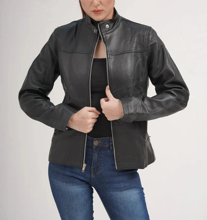 ZERXHIDE black leather jacket back view — fitted lambskin silhouette with panel seaming and band collar, styled with jeans