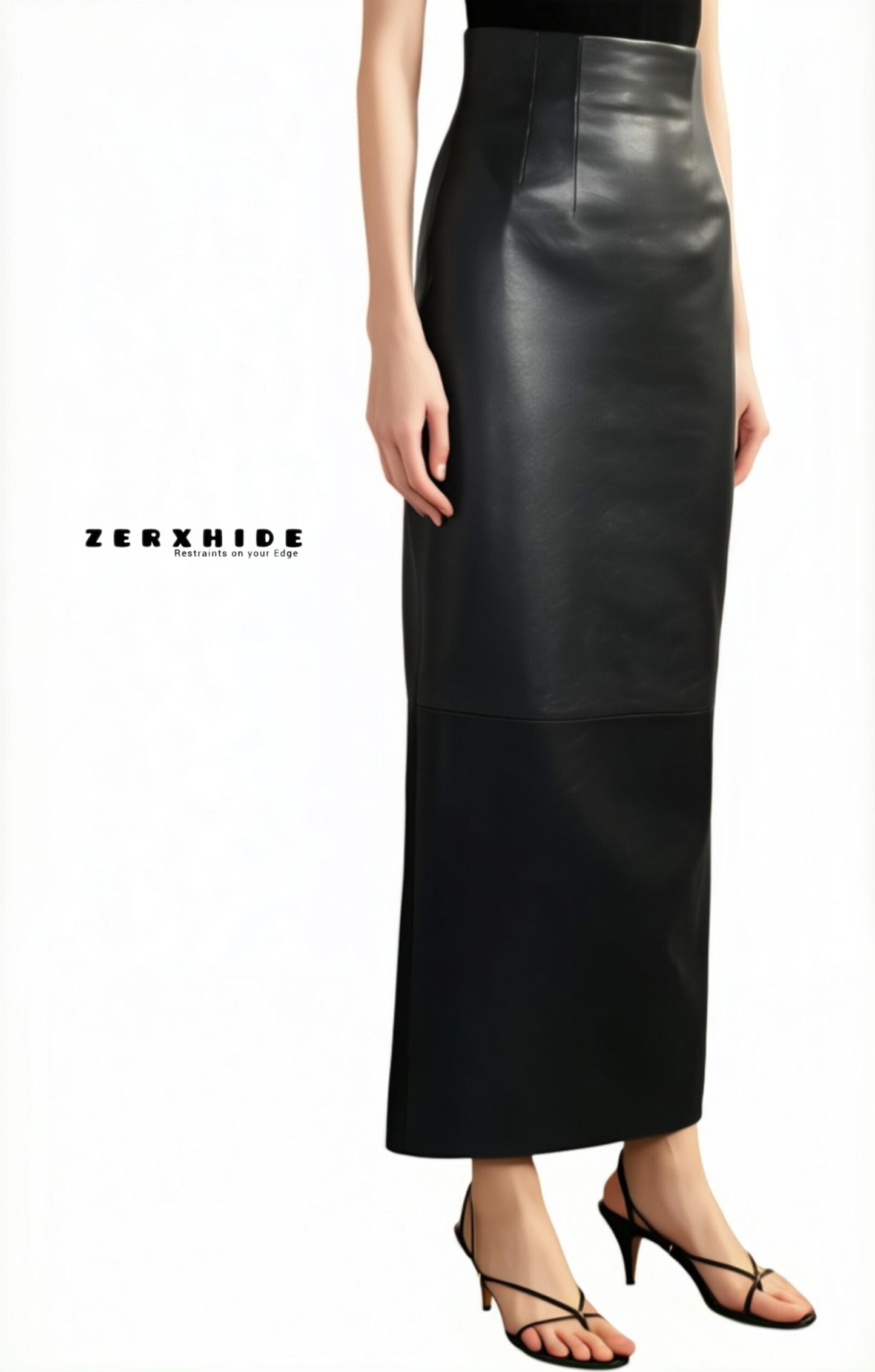 Woman wearing ZERXHIDE black leather skirt — full length maxi with side slit, styled with sleeveless black top and strappy heels