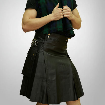 Man wearing a black kilt and green plaid scarf on a gray background