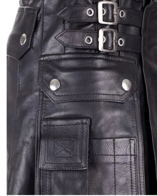 Close-up of a black leather jacket with silver buckles and buttons.