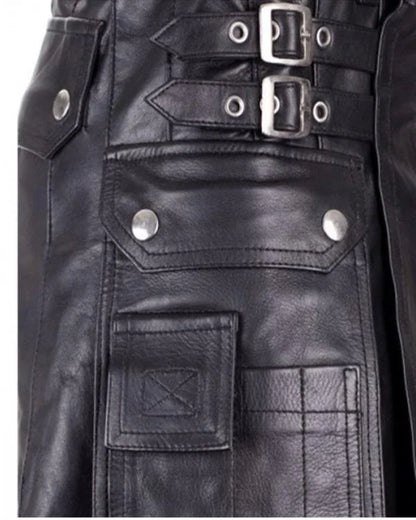 Close-up of a black leather jacket with silver buckles and buttons.