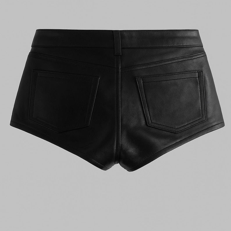 Black leather shorts on a gray background