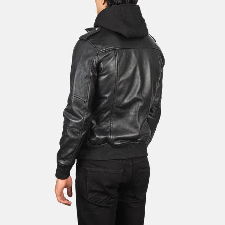 Black leather jacket worn by a person on a white background
