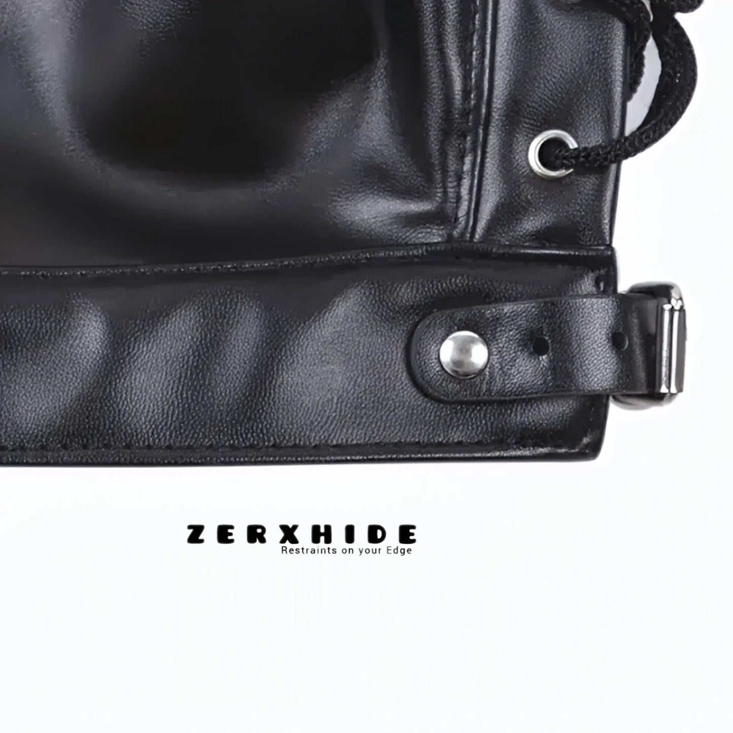 Close-up of the heavy-duty buckle and reinforced stitching on the ZERXHIDE leather hood collar.