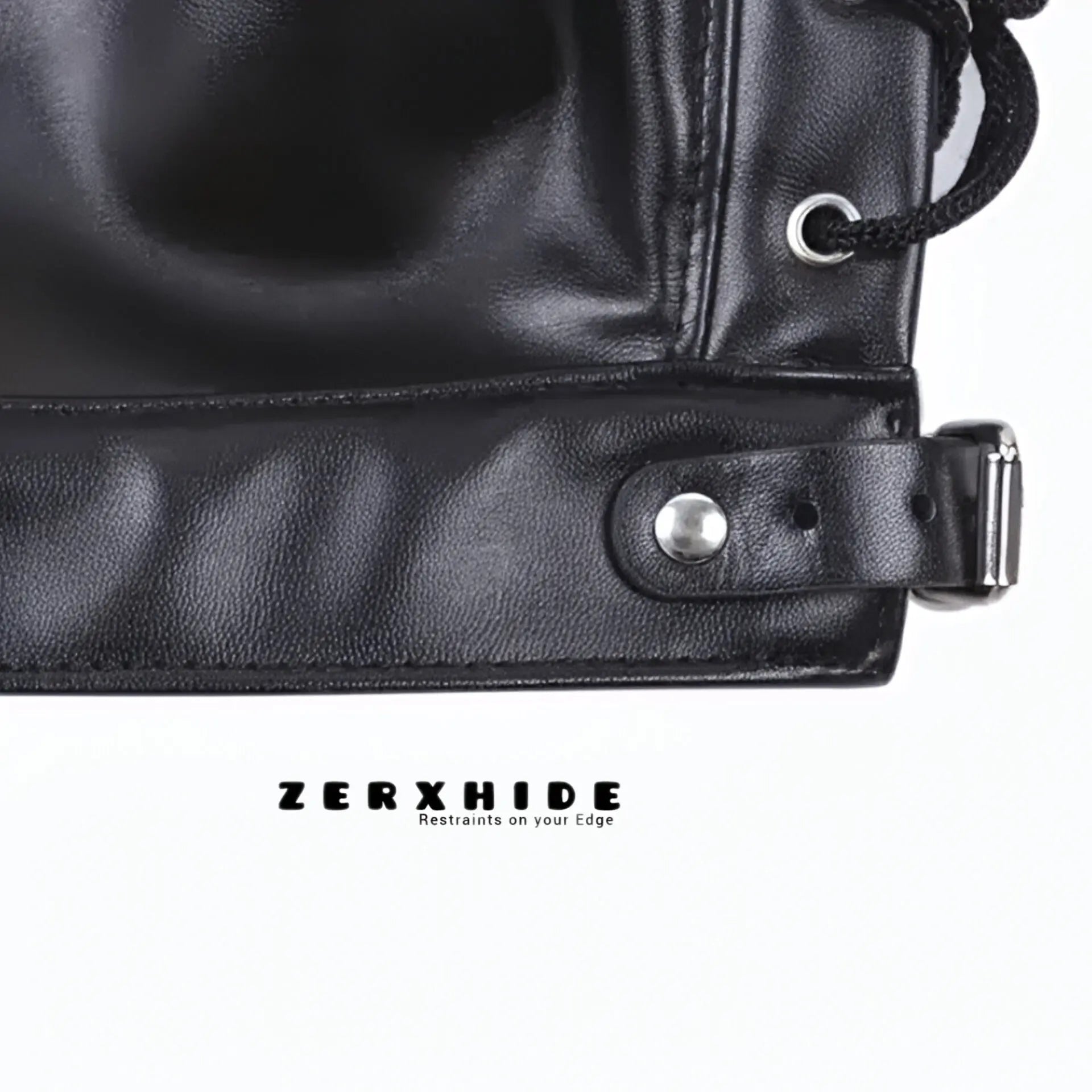 Close-up of the heavy-duty buckle and reinforced stitching on the ZERXHIDE leather hood collar.